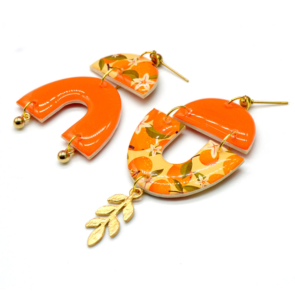 Boucles d'oreilles asymétriques motif fruit orange