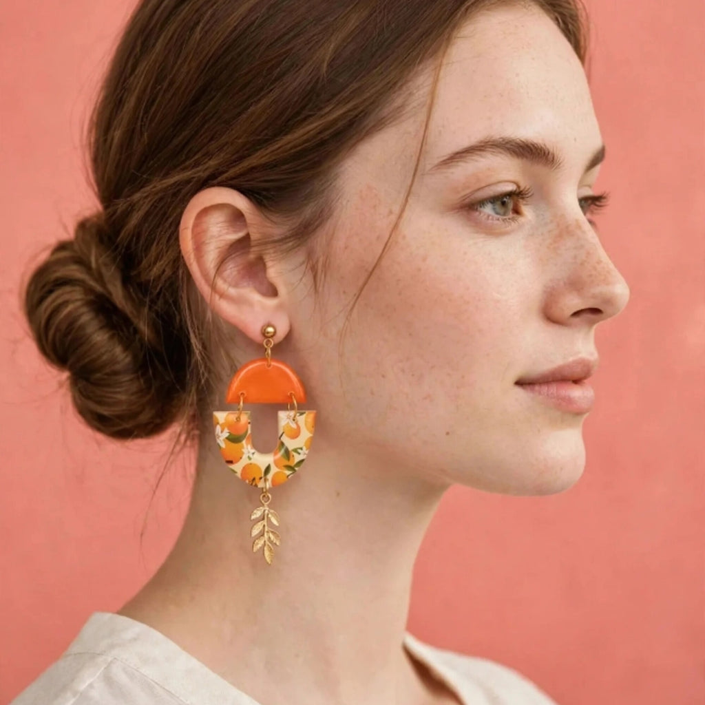 Boucles d'oreilles asymétriques motif fruit orange