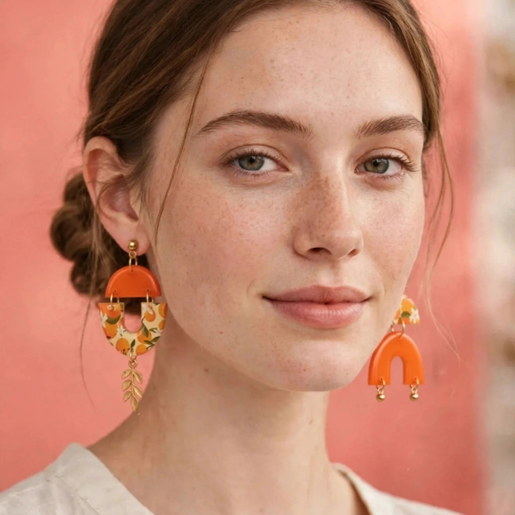 Boucles d'oreilles asymétriques motif fruit orange