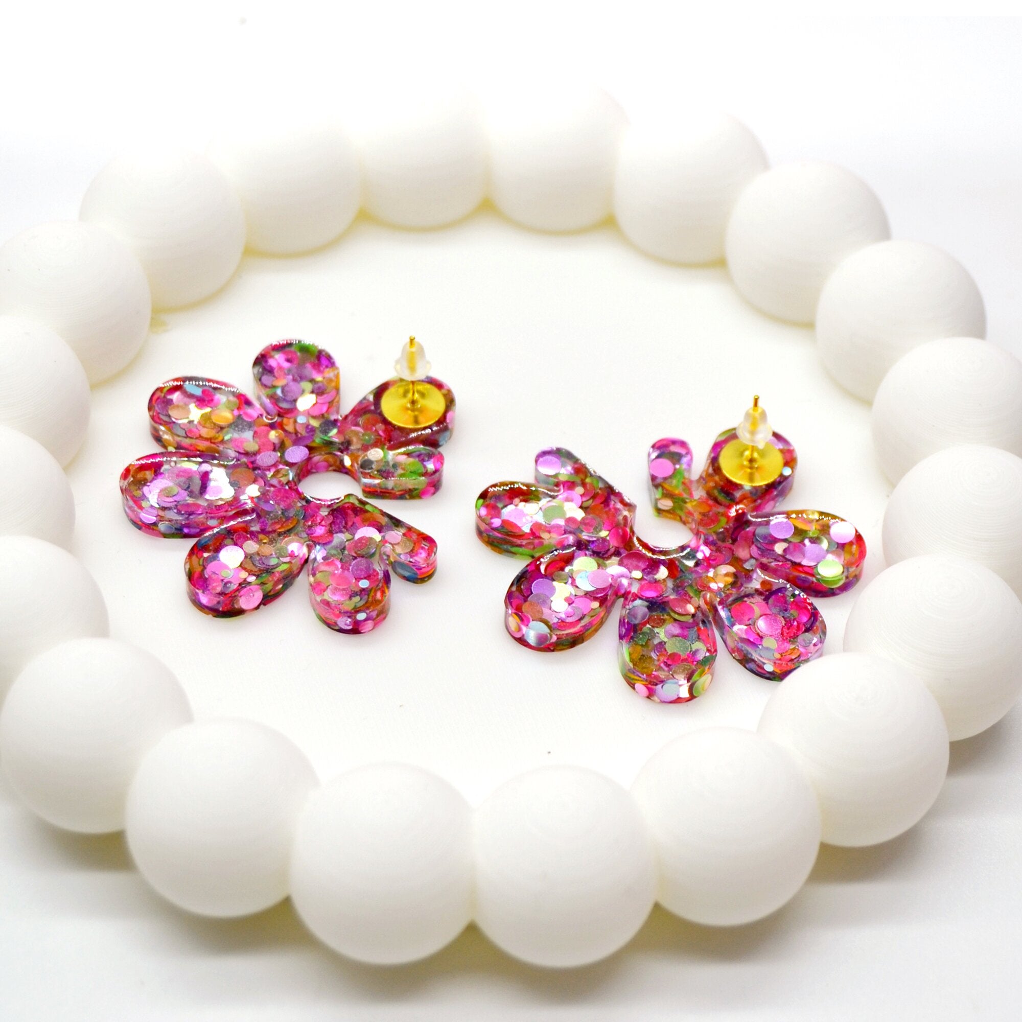Boucles d'oreilles marguerite pailletée rose