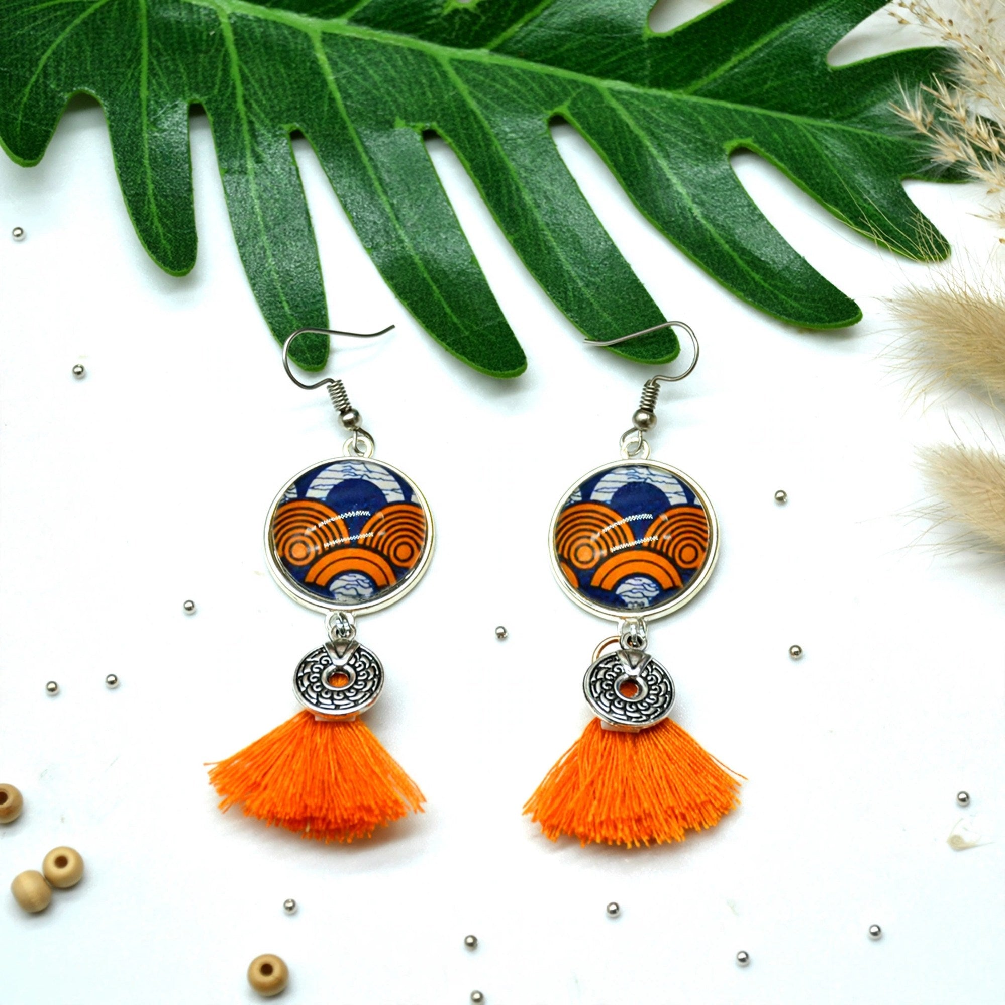 Boucles d'oreilles pompon wax orange